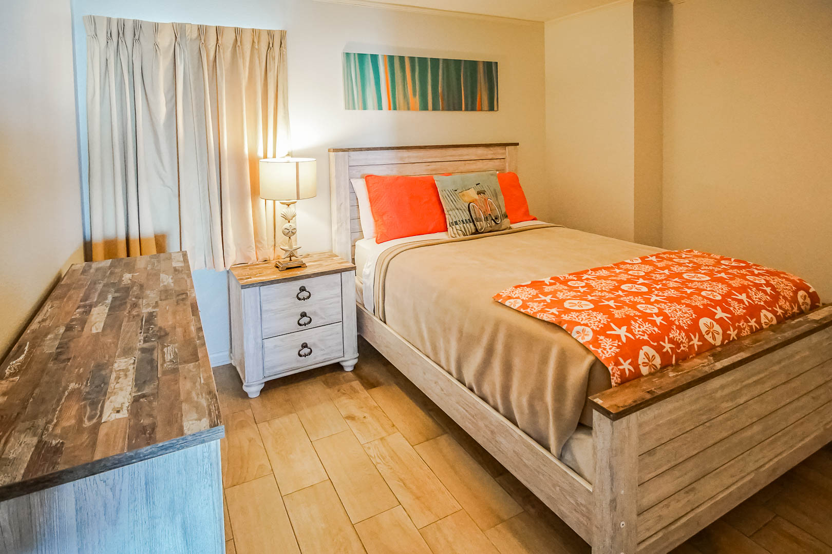 A vibrant bedroom at VRI's Shoreline Towers in Gulf Shores, Alabama.